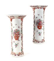 A pair of 19th century Samson porcelain flared cylindrical vases decorated with urns of flowers,