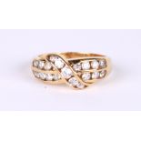 An 18ct gold ring set with white stones, approx UK size 'P', 5.7g.