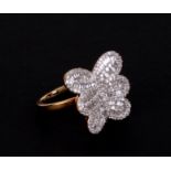 A 9ct gold diamond encrusted butterfly ring, approx UK size 'N', 5.2g.