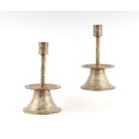 A pair of 17th century style Ottoman type brass candlesticks, 22cms high (2).