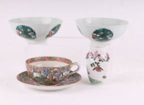 A 20th century Chinese Canton famille rose cup and saucer; together with two famille rose bowls