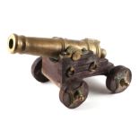 A Signal Cannon with a 49cms (19.25ins) cast brass barrel. With an approximate bore diameter of 4cms