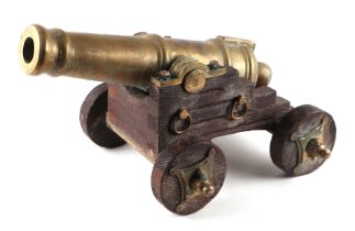 A Signal Cannon with a 49cms (19.25ins) cast brass barrel. With an approximate bore diameter of 4cms