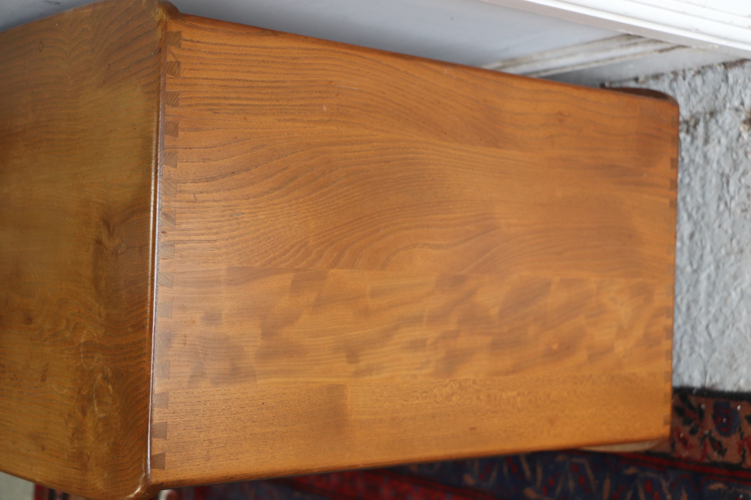 An Ercol sideboard with three cupboards above two long drawers, 131cms wide. Condition Report The - Image 2 of 9