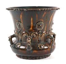 A Burmantofts style pottery jardiniere with drip glaze decoration, 26cms diameter (a/f). Condition