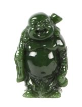 A Chinese carved jade / hardstone figure of Buddha, 8cms high.