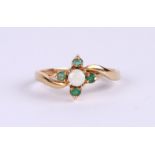 A 9ct gold opal and emerald cluster ring, approx UK size 'L', 2g.