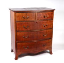An Edwardian mahogany bowfront chest of two short and three graduated long drawers, on bracket feet,