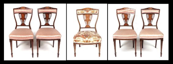 A set of four late 19th century inlaid rosewood chairs with upholstered seats and backs, makers