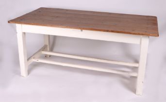 An Irish pine farmhouse table on a painted base with square legs joined by a double stretcher, 171