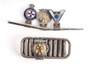 A chrome badge bar with badges to include Royal Yacht Association, the AA and Veteran Motorists 58