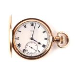 A Waltham rolled gold pocket watch, the white dial with Roman numerals and subsidiary seconds