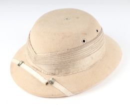 A pith helmet manufactured by Express Yead & Co.