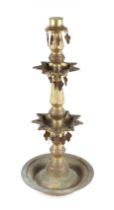 An Islamic brass stand, 60cms high.