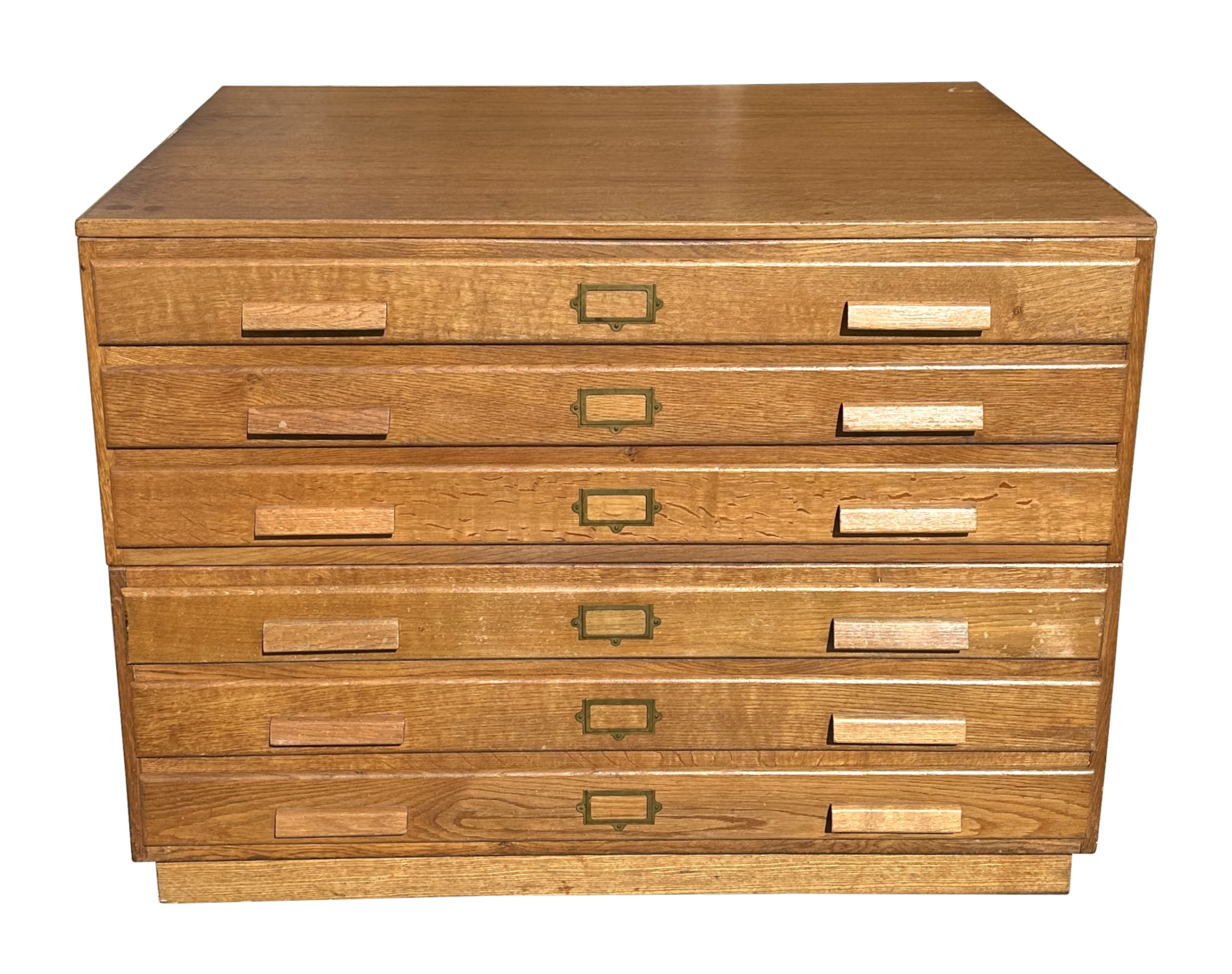 A mid century oak architect's plan chest with two sections of three long drawers, 115cms wide, 82cms
