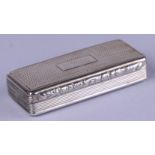 A Victorian silver snuff box with engine turned decoration, the lid with presentation inscription