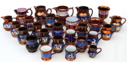 A group of Victorian lustre ware jugs and other lustre ware items, the largest 13cms high.