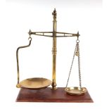 A set of Victorian style brass shop scales, 50cms wide.