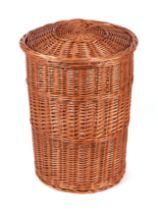 A wicker laundry basket.