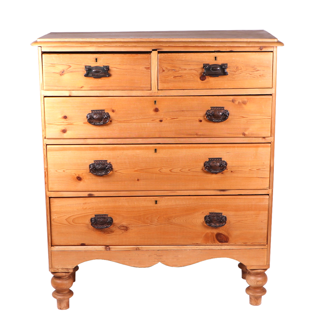 A late 19th century pine chest of two short and three graduated long drawers, on turned feet,