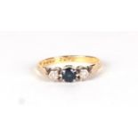 An 18ct gold diamond and sapphire ring, approx UK size P, 2.7g.