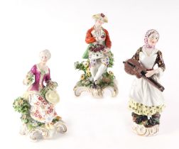 A pair of late 19th century continental porcelain Meissen style figures of a courting couple in