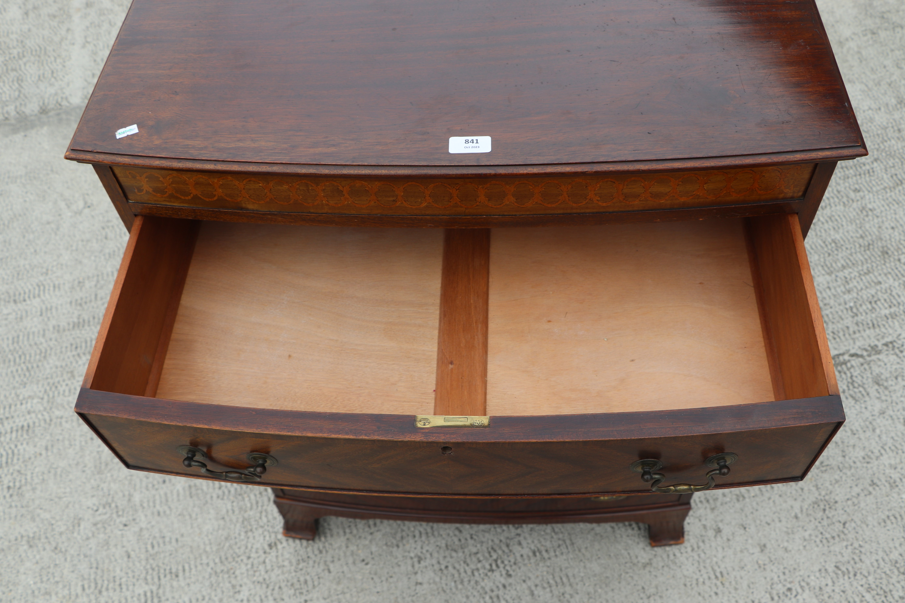 An Edwardian mahogany chest of four graduated long drawers, on bracket feet, 76cms wide. Condition - Image 8 of 13