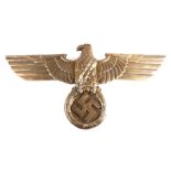 A modern cast metal Third Reich style eagle plaque, 102cms wide.