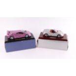 A Gwilo International Ltd 1:18 scale Porsche Boxter, mounted on a plinth, boxed; together with a