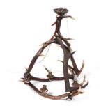 A Bavarian style antler chandelier, approx 70cms wide.