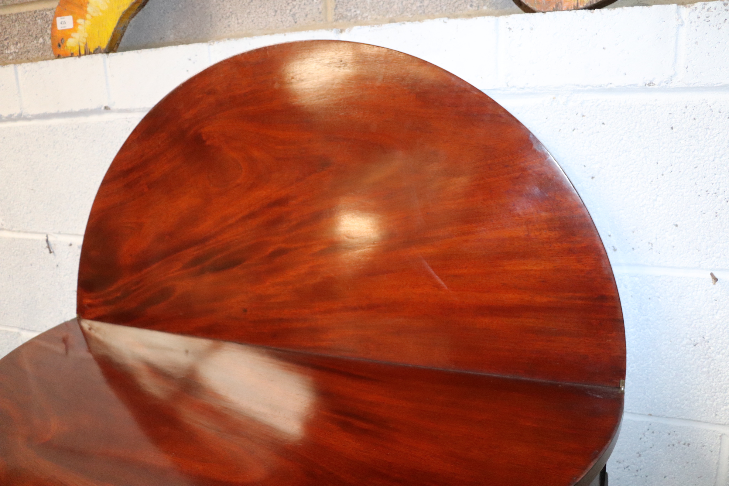 A mahogany demi lune tea table on square tapering legs terminating in spade feet, 94cms wide. - Image 5 of 6