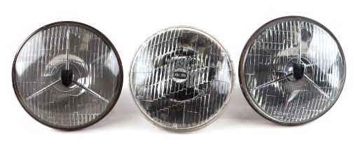 A pair of Original Lucas PL700 Tripod headlights as fitted to various British sports cars