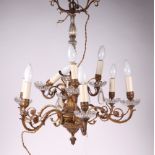 A gilt metal and crystal nine-branch ceiling light, 67cms high. Condition Report one light fitting