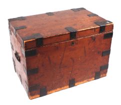 A Victorian stained pine travelling trunk with steel banding and carrying handles, 80cms wide.