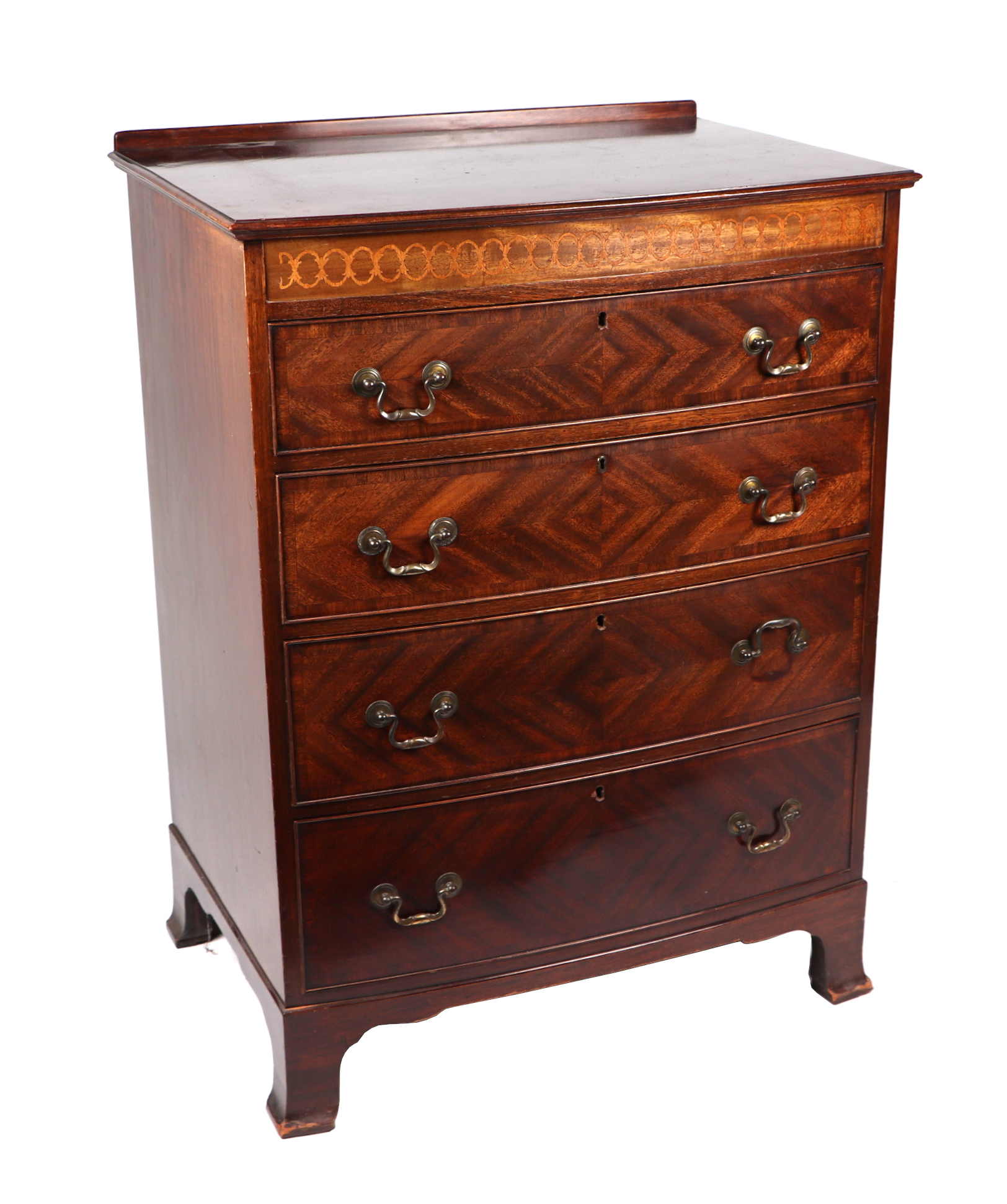 An Edwardian mahogany chest of four graduated long drawers, on bracket feet, 76cms wide. Condition