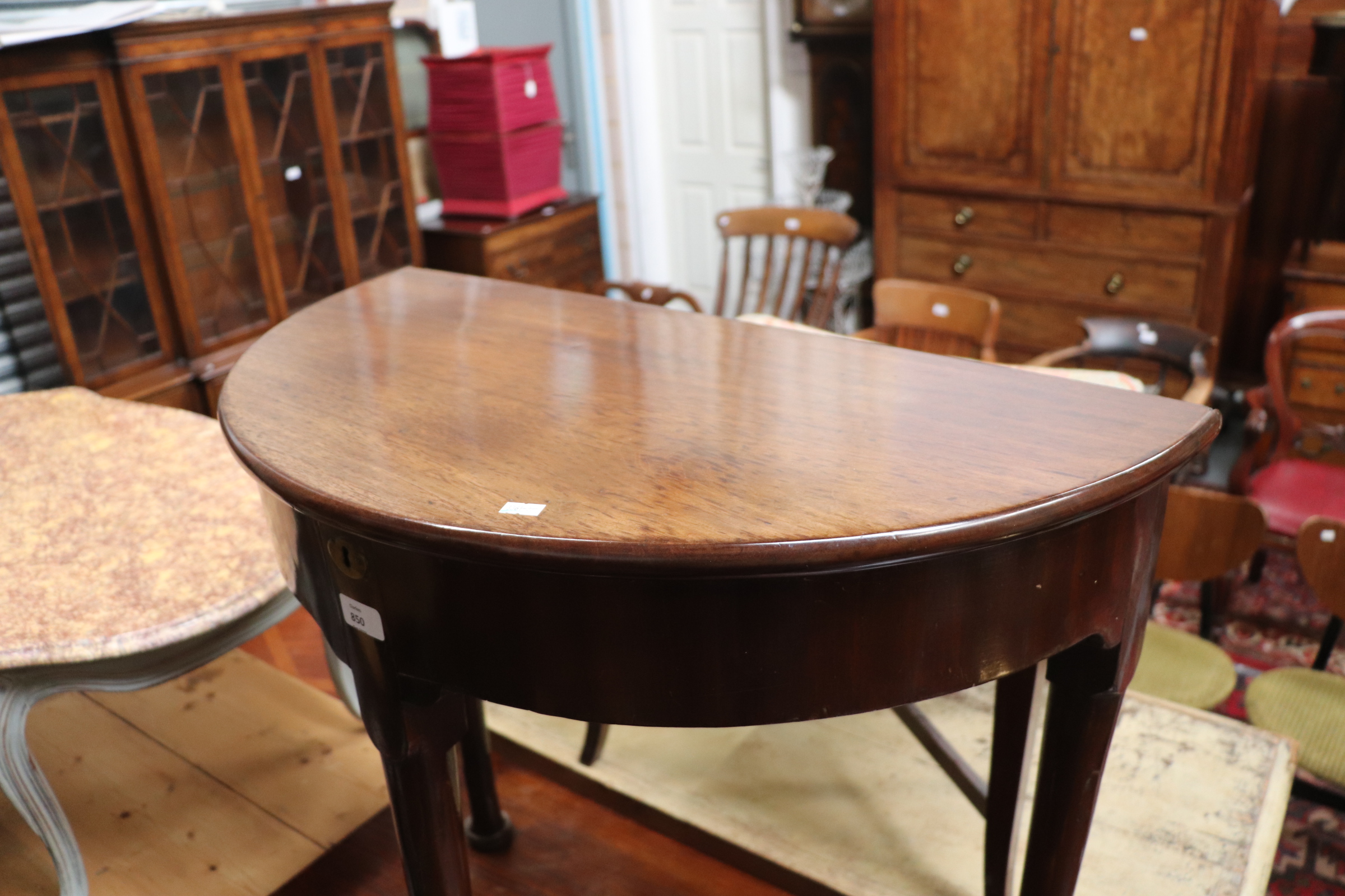 A Georgian mahogany demi lune side table with lift-up top, on turned legs and pad feet, 77cms wide. - Image 4 of 14