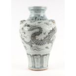 A Chinese blue & white baluster vase decorated with dragons amongst clouds, 36cms high.