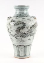 A Chinese blue & white baluster vase decorated with dragons amongst clouds, 36cms high.