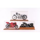 A 1:12 Ducatti racing motorcycle; a Triumph WWII Dispatch Rider's motorcycle and a Triumph Speed