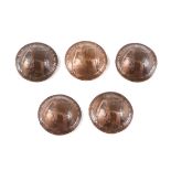 A set of five WW1 British army Brodie helmets made from English copper pennies, each coin dated