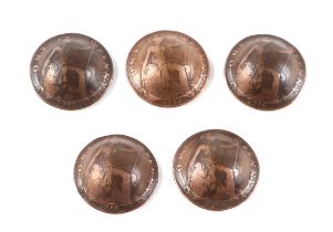 A set of five WW1 British army Brodie helmets made from English copper pennies, each coin dated