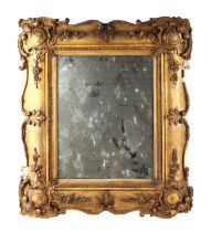 A Victorian style gilt gesso wall mirror decorated with swags and fleur de lys, 60cms wide.