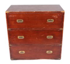 A late 19th century military teak Campaign chest of three long drawers with recessed brass handles