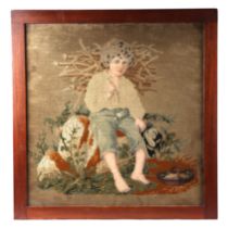 A 19th century needlework picture depicting a faggot gatherer, 47 by 48cms, framed & glazed.