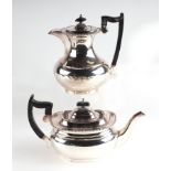 A two-piece silver plated tea service.