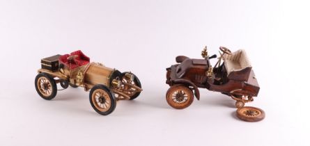 A scratch built wooden model of a 1903 Mercedes 36HP Roadster, 31cms long, in a carrying case; and