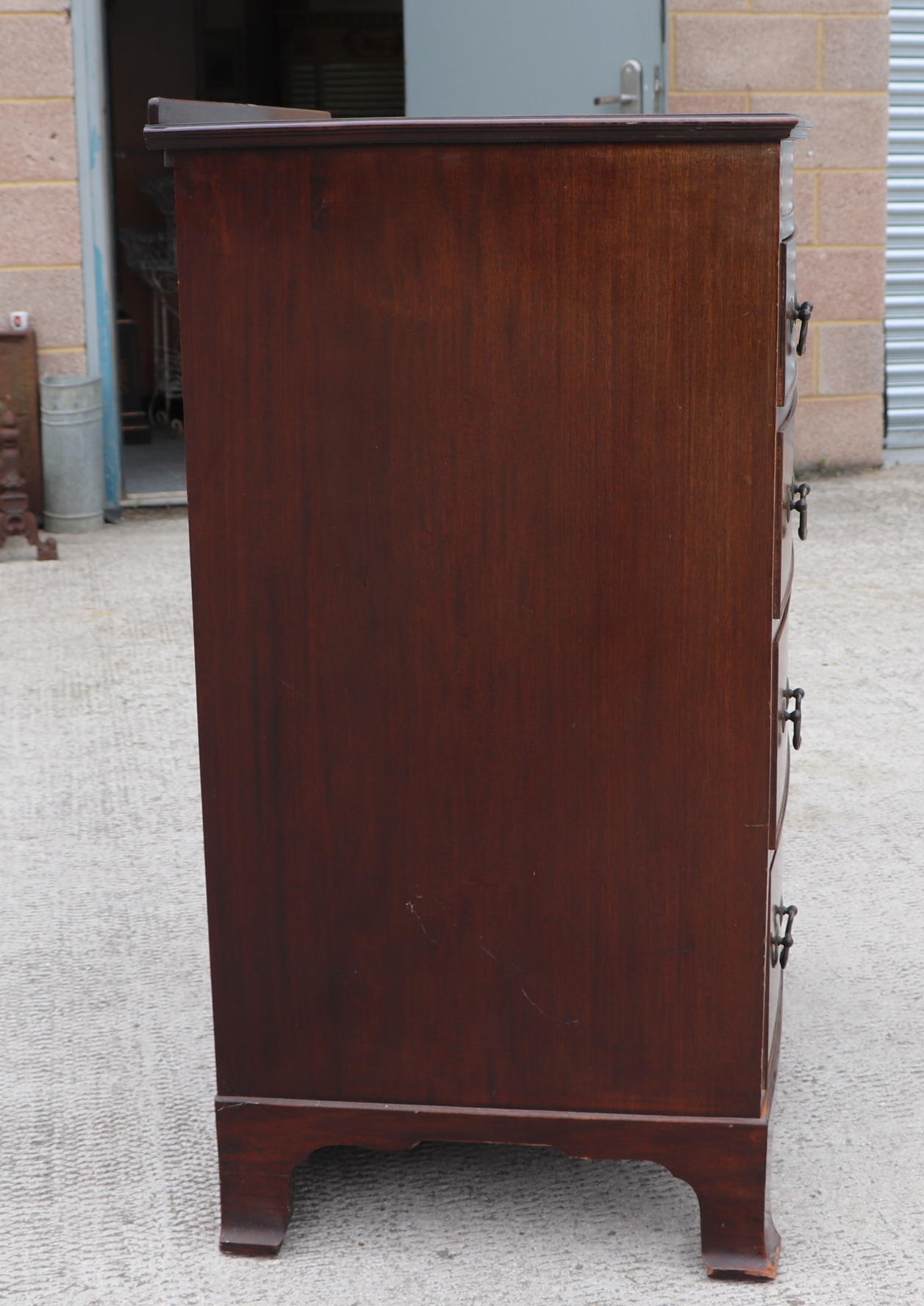 An Edwardian mahogany chest of four graduated long drawers, on bracket feet, 76cms wide. Condition - Image 6 of 13