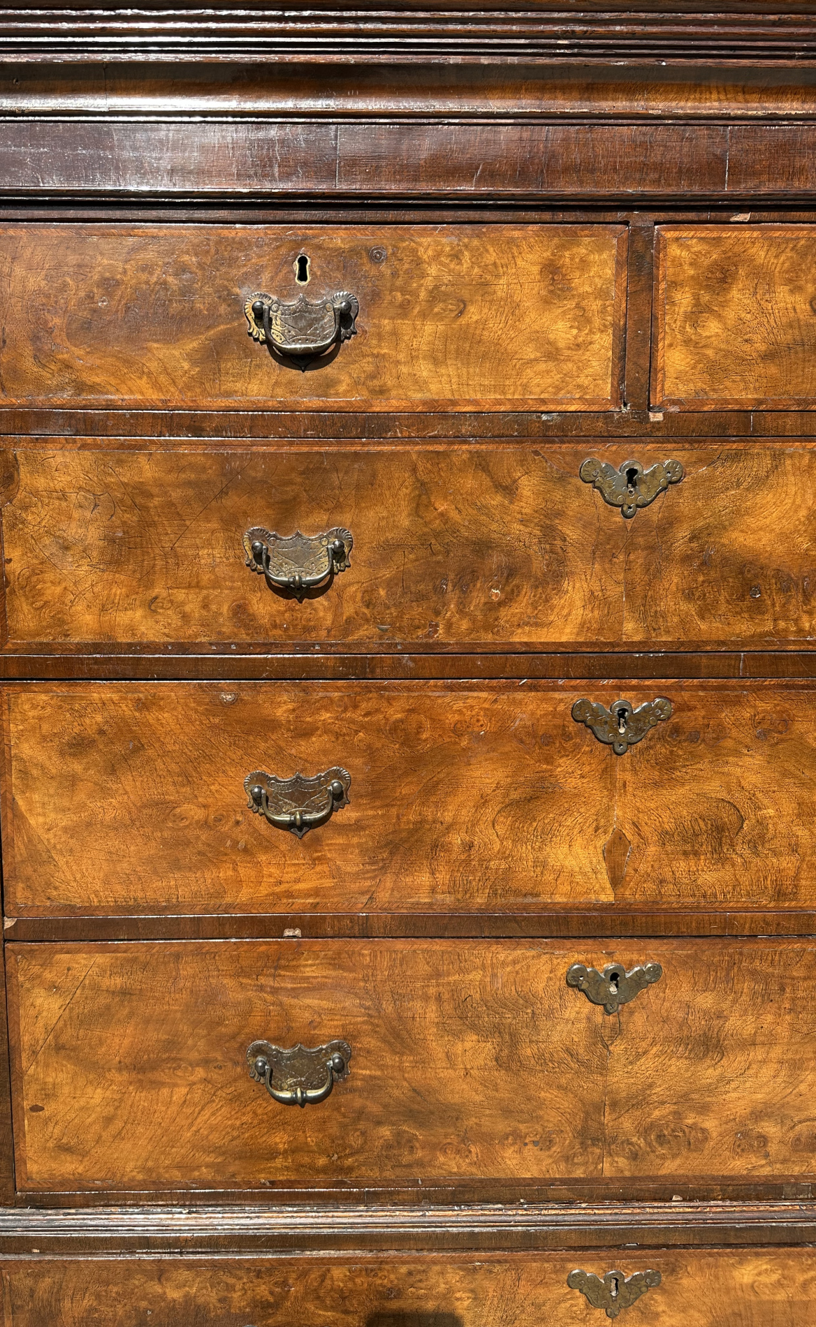 An 18th century style walnut veneered tallboy with moulded cornice above two short and six long - Image 5 of 7