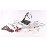 Assorted Victorian style hand held magnifying glasses.