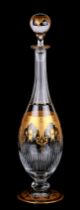 A Baccarat gilded glass decanter and stopper, 43cms high. Condition Report Very good condition